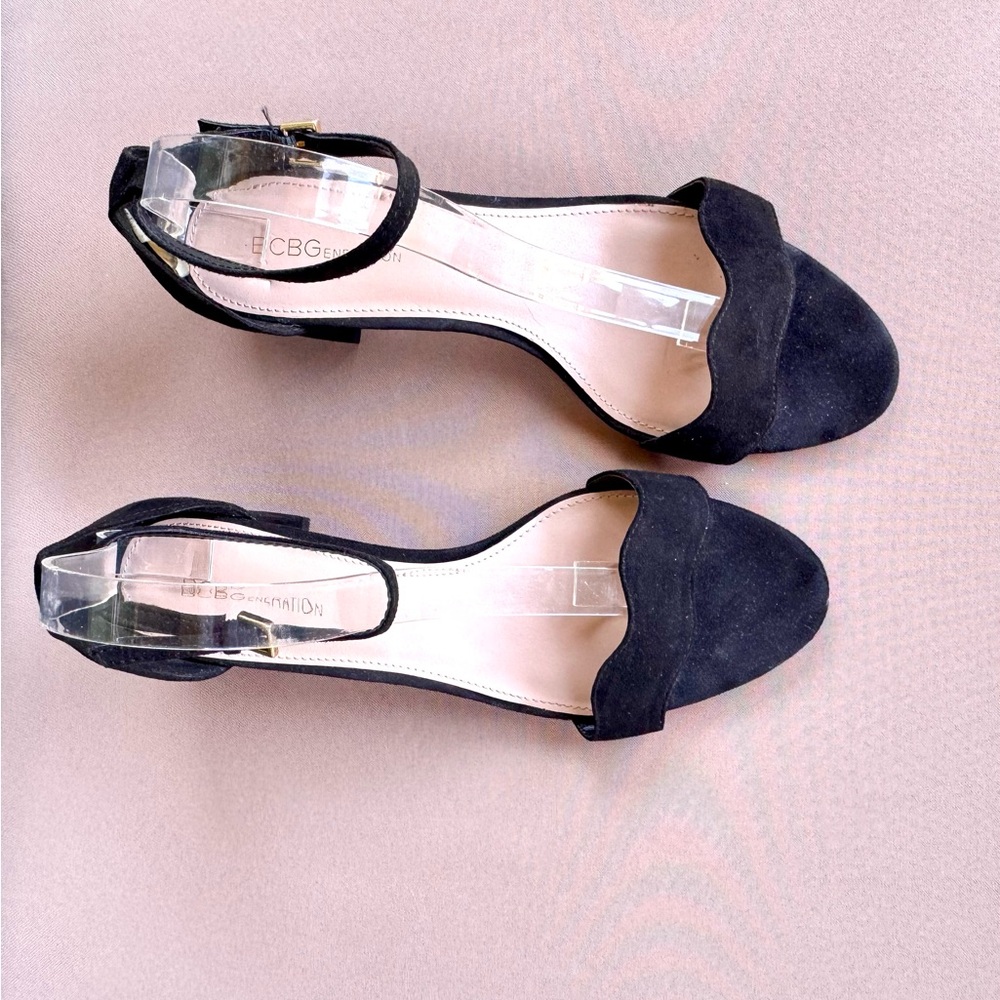 BCBG Black Heels with Sleek Design. Good used condition.